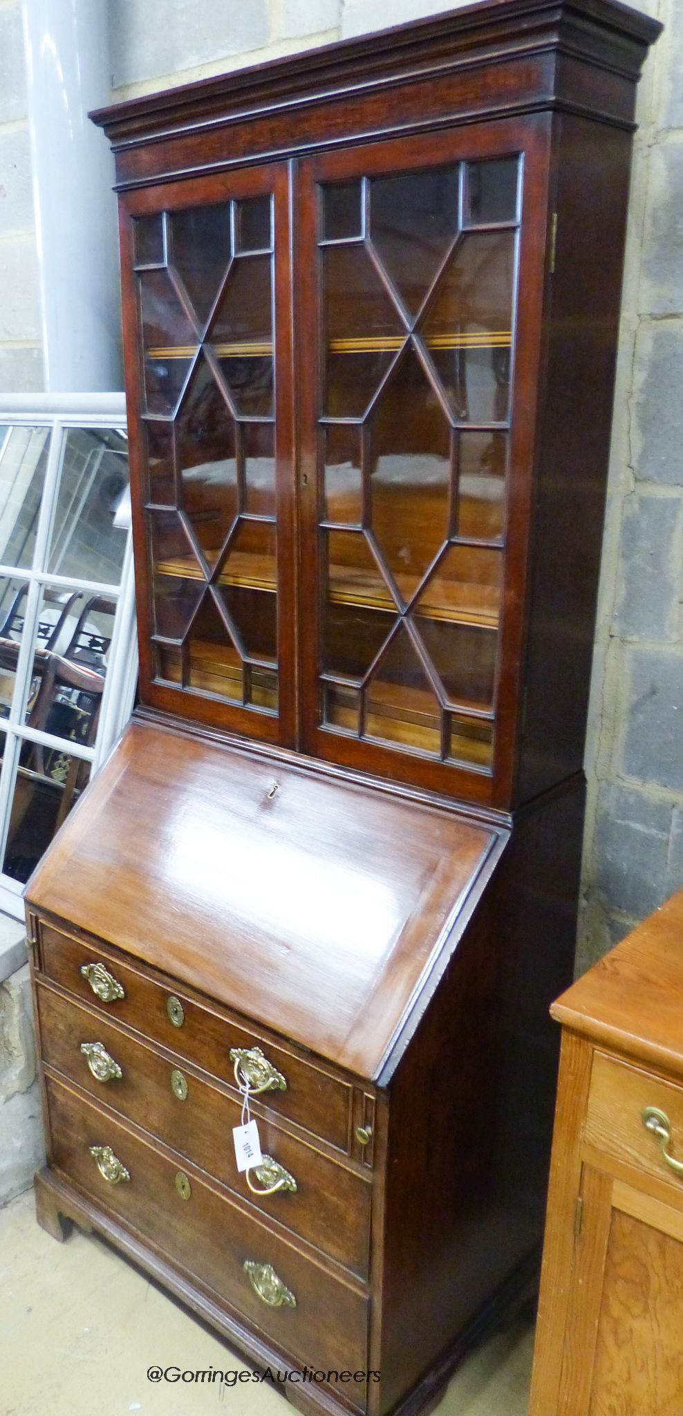 A small George III and later mahogany bureau bookcase, width 76cm depth 50cm height 192cm